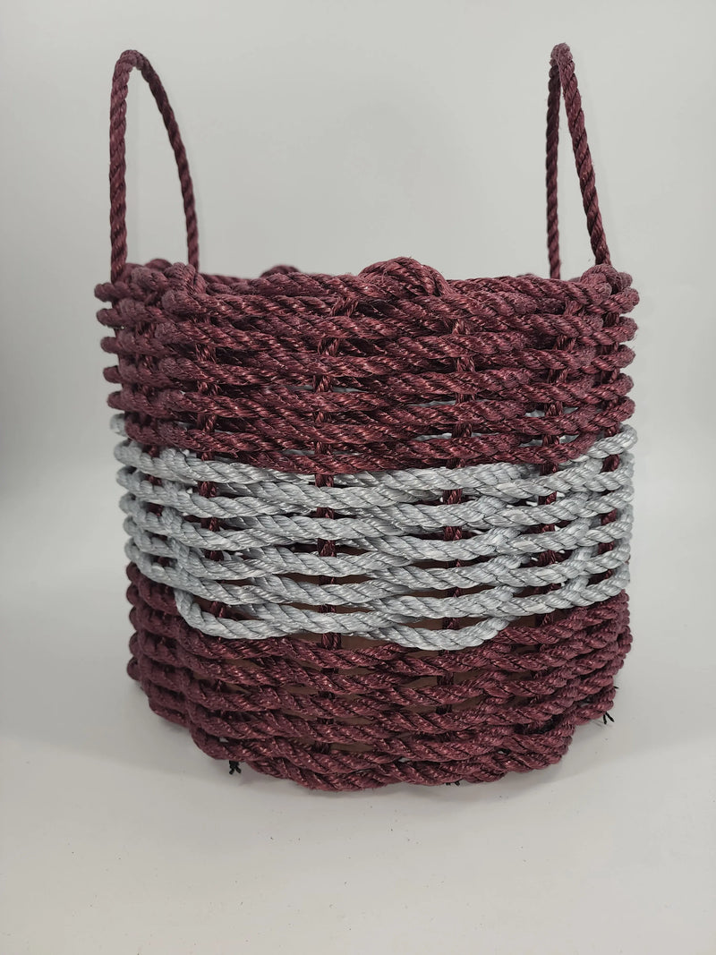 Photo shows a Burgundy Lobster Rope basket with a light gray stripe in the middle