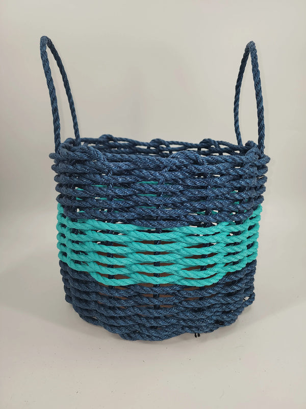 pictured is a navy blue lobster rope basket with a teal stripe in the middle