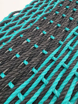 Black and Teal Lobster Rope mat. black stripe in the middle