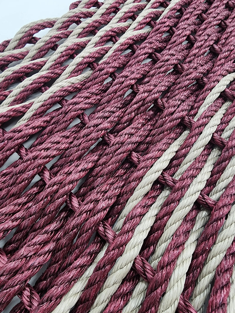 Burgundy and Tan double weave rope mat. burgundy stripe in the middle