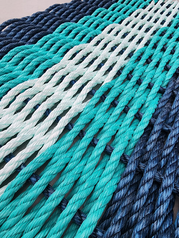 5 Stripe rope rope welcome mat in the color pattern Navy Blue, Teal, Seafoam, Teal and Navy Blue