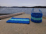 image shows a blue and teal lobster rope and basket